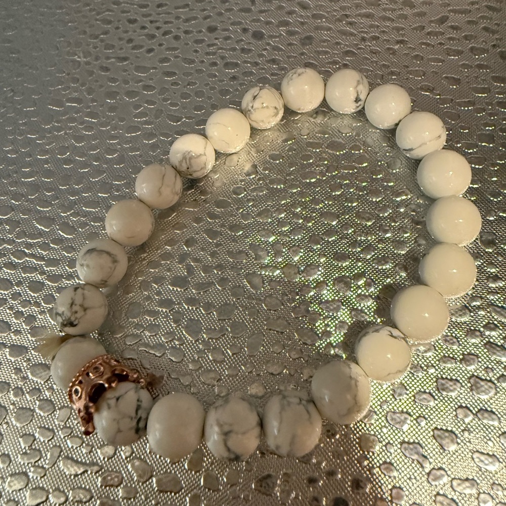 Crown Bracelet Possibly white homolite. It’s part of a pair of a couples set